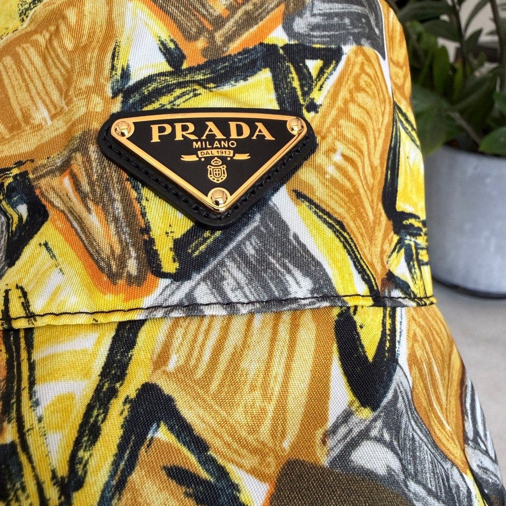 Prada Graphic Print Nylon Bucket Hat Black Gold Triangle Logo 1HC137 Size SM - Picture 2 of 8